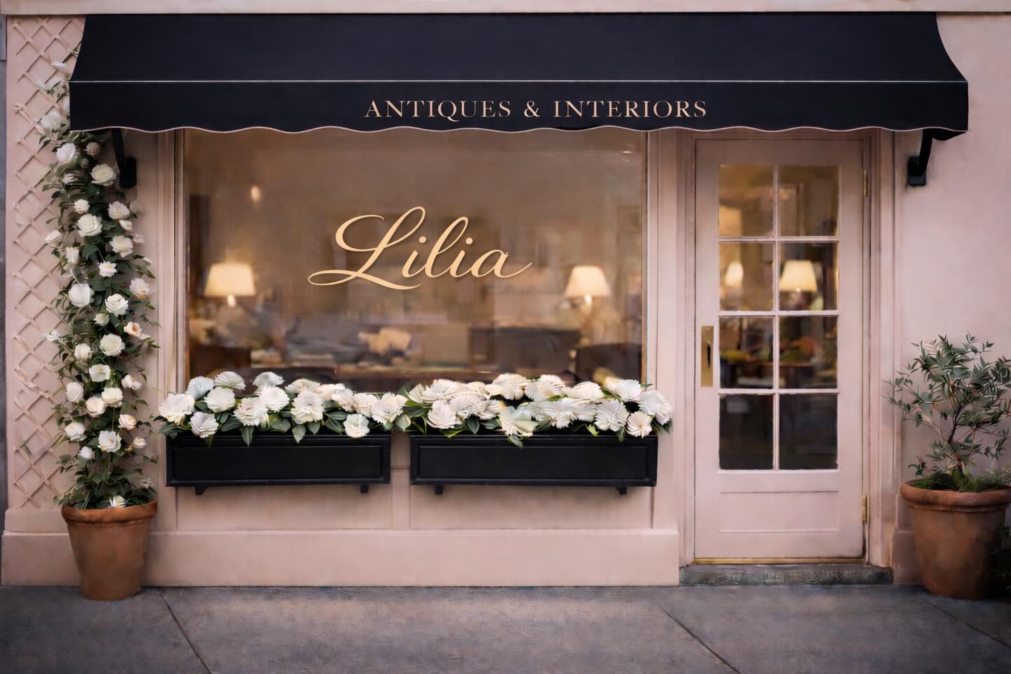 The Lilia storefront on Bailey Avenue — pink façade, black scalloped awning, and window boxes of white roses